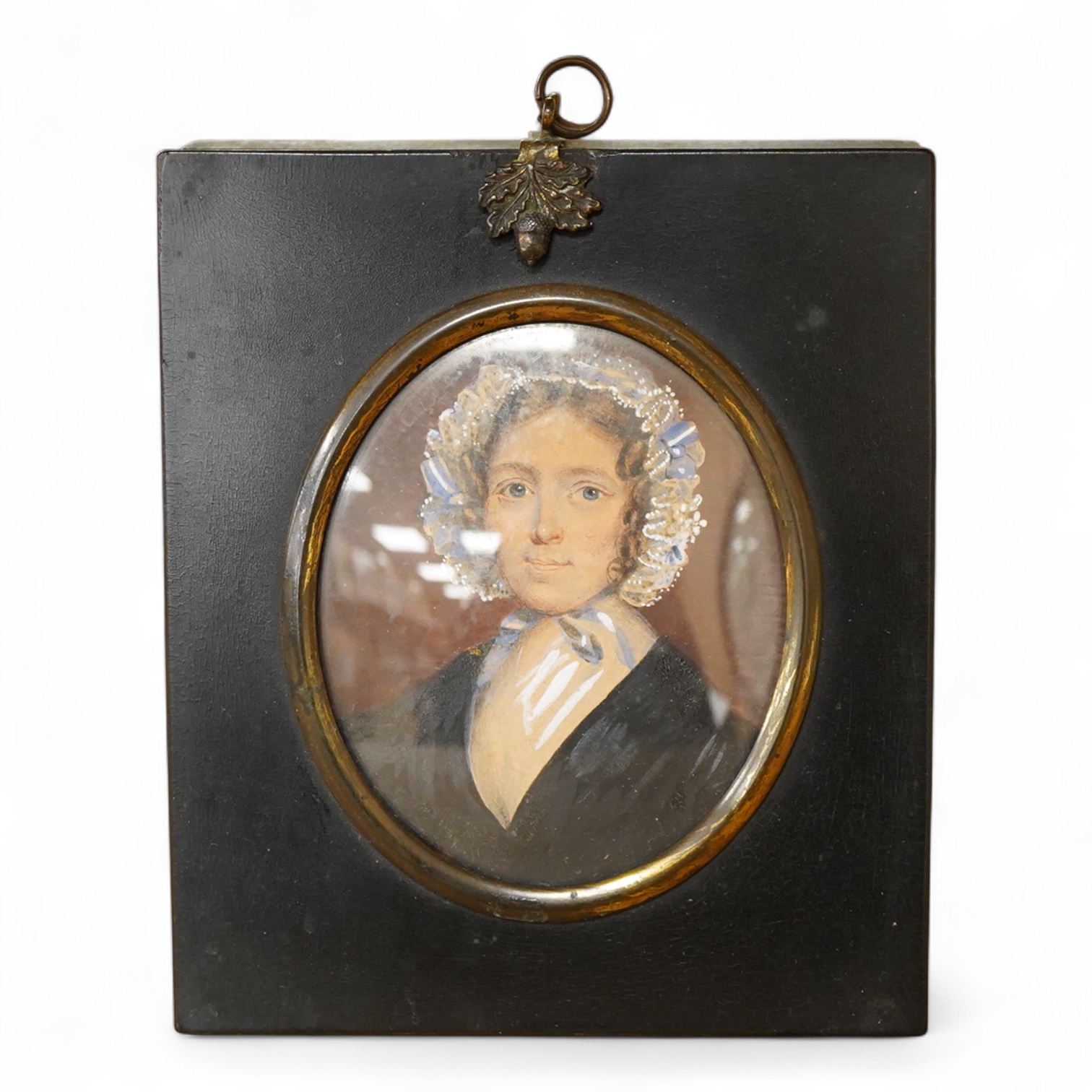 Regency school, Portrait miniature Harriet Hackey, neé Spencer, Leicestershire, oval watercolour on card, housed in an ebonised frame, 9 x 7cm